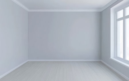 Bright and spacious room features light gray walls and a large window that allows natural light to fill the space.の素材