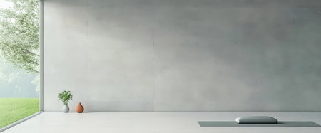 This serene interior showcases a minimalist yoga space designed for relaxation and mindfulness. Natural light floods in through large windows highlighting a calm atmosphere.の素材