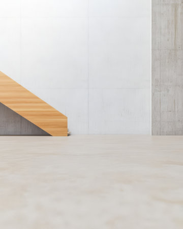 A spacious room features a sleek wooden staircase against a concrete wall. The clean lines and neutral tones create a calm contemporary atmosphere ideal for modern living.の素材