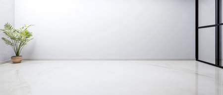 Bright and spacious interior showcasing a minimalist design. A lone potted plant adds a touch of nature to the room with large windows allowing sunlit ambiance.の素材