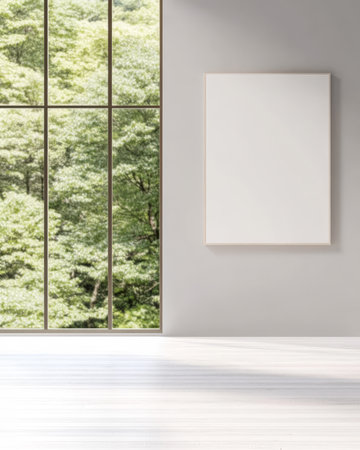 Spacious room showcases a clean empty wall perfect for artwork accompanied by a large window revealing vibrant greenery. Natural light enhances the tranquil atmosphere.の素材