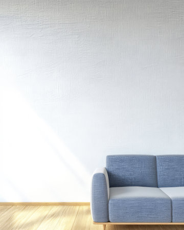 A stylish living room features a comfortable blue and white couch against a light-colored wall.の素材