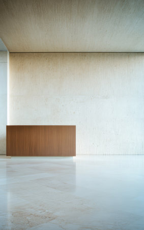 A spacious interior showcases a sleek wooden reception desk against a plain light-colored wall. Natural light brightens the area highlighting the minimalist design and polished floor.の素材