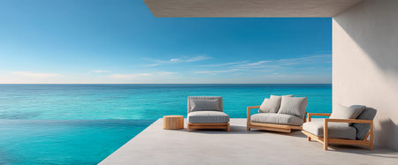 Comfortable seating arranged on a balcony beside clear turquoise water. The setting offers a serene atmosphere perfect for relaxation and enjoying the beautiful ocean view under clear skies.の素材