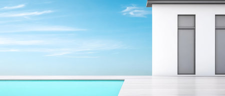 A sleek contemporary building overlooks a tranquil swimming pool under a clear blue sky. The space is designed with simplicity and elegance in mind creating a peaceful atmosphere.の素材