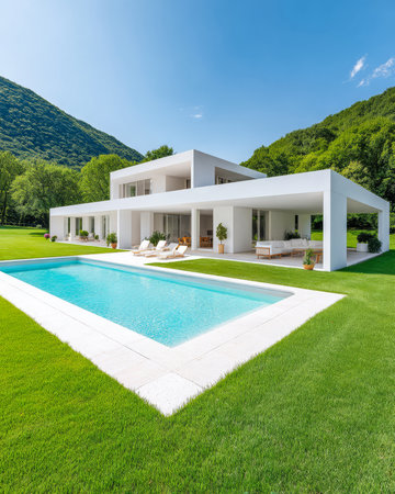 Contemporary villa featuring a spacious inviting pool and a well-manicured lawn set against a backdrop of majestic mountains and vibrant trees. Perfect for outdoor leisure and relaxation.の素材