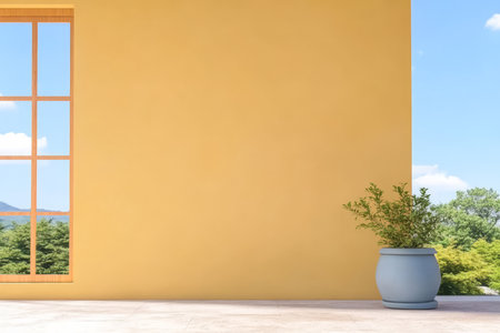 Bright interior showcases a yellow wall with a large window offering a view of lush greenery. A light blue pot holds a fresh green plant creating a tranquil atmosphere.の素材