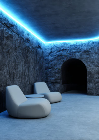 This tranquil space showcases sleek white chairs in a minimalist design illuminated by soft blue lights against rugged stone walls creating a serene atmosphere perfect for relaxation.の素材