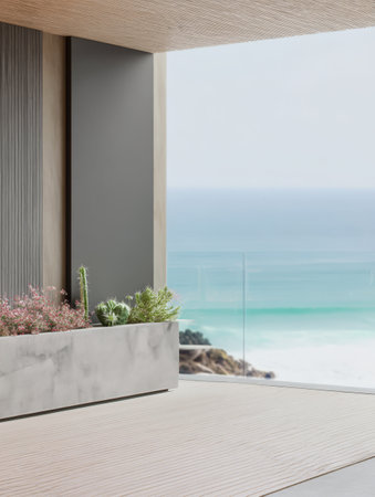 This outdoor space showcases a modern design with a simple planter filled with greenery. The expansive ocean view adds tranquility blending nature and architecture seamlessly.の素材