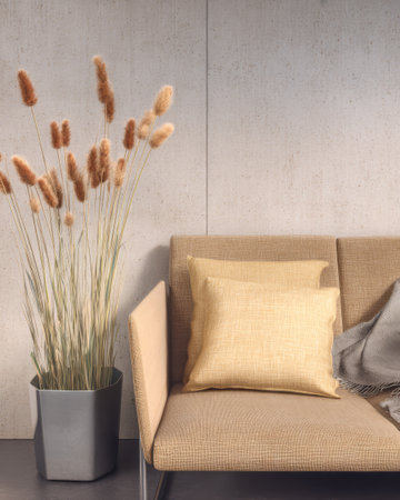 A stylish living room corner features a light beige sofa decorative cushions and a tall planter with natural dried plants. The minimalist design showcases tranquility and elegance.の素材