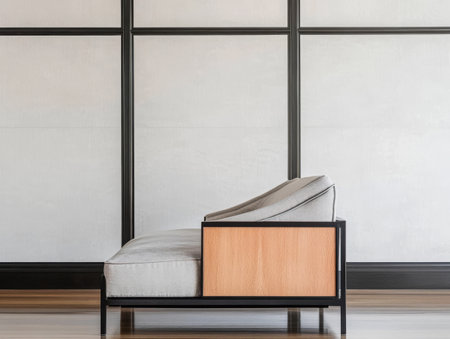 A stylish minimalist chair features a combination of light fabric and wood in a modern interior space. The clean lines and neutral colors enhance the overall aesthetic of the room.の素材