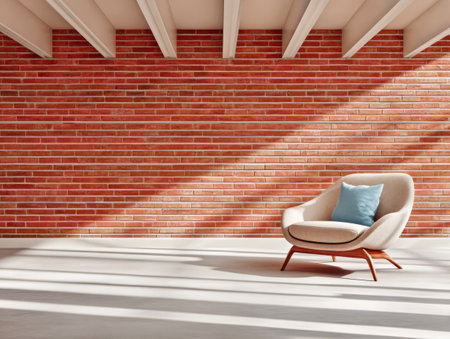 A stylish chair with a blue cushion sits in a spacious room adorned with a warm red brick wall. Sunlight streams in casting soft shadows on the white floor enhancing the inviting atmosphere.の素材