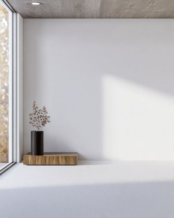Natural light fills the room from a large window, highlighting a black vase with delicate plants on a wooden shelf, creating a serene, minimalist atmosphere.の素材
