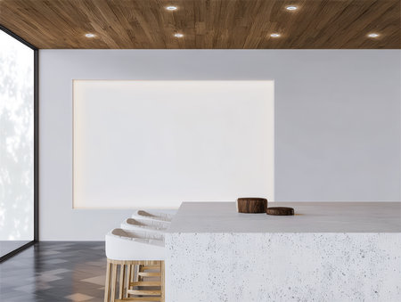 Bright and airy kitchen showcases a simple design with a large stone island, wooden accents, and plenty of natural light streaming in through the window.の素材