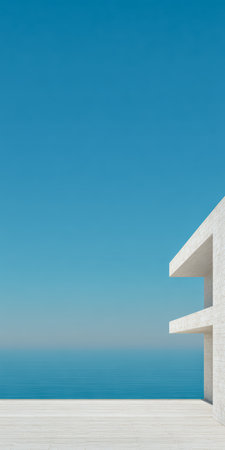 A sleek white building stands elegantly at the edge of a calm ocean, with a bright blue sky above. This tranquil scene captures the beauty of modern architecture by the sea.の素材