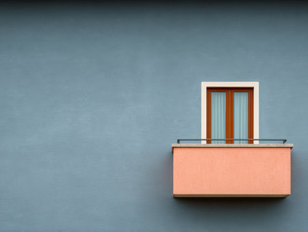 A wooden window framed in white is set above a pink balcony, positioned against a smooth blue wall in a quiet urban setting. This design highlights minimalism and charm.の素材