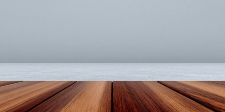 A smooth wooden surface extends toward a vast misty horizon. The scene captures the peacefulness of dawn with soft light and a muted color palette.の素材