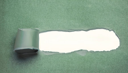 Close up view of a torn recycle brown paper with space on white. Generative AIの素材