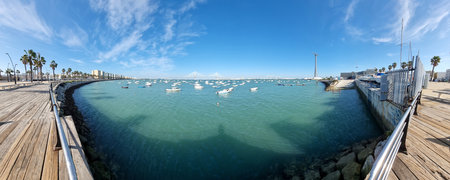 Panoramic view of the bay of Cadiz, with small pleasure boats and the Constitution Bridge in the backgroundの写真素材