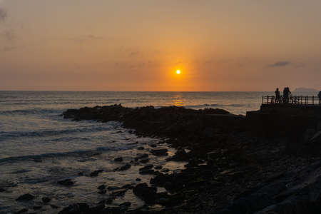 Sunset Landscape in the shore of Lima Peru, rocksの写真素材