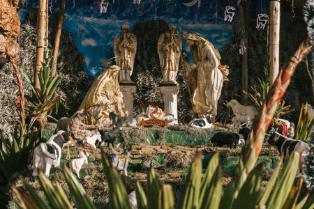 Life size decoration with statues of holy family of jesus, surrounded with animals and plants.の写真素材