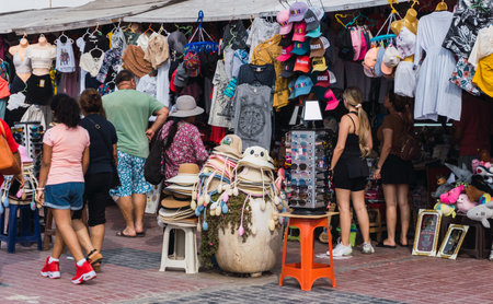 unrecognizable people walking in El Chaco boulevard, Ica Peru, looking for souvenirsの写真素材
