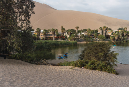 View of Huacachina lagoon in sunny day, Ica Peruの写真素材