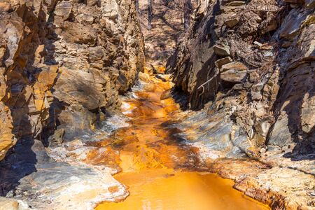 The Rio Tinto in the province of huelva, Andalucia, Spain. It is an incredible landscape that has studied for its similarity to the planet Mars. It was stolen by an English mining company.の写真素材