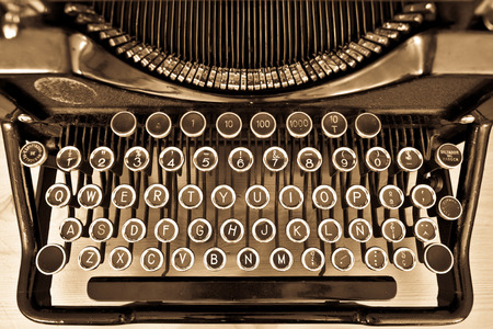 View of an antique manual Underwood typewriter on sepiaの写真素材
