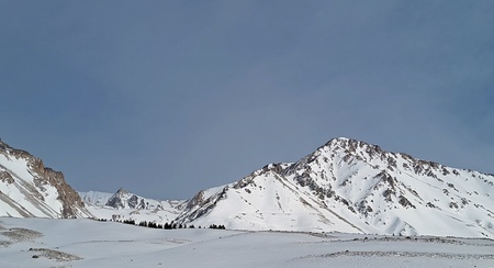 snowy peaks in the Andes Mountains. mountain villages, ski resorts in Argentina, hidden routes. beautiful landscapesの写真素材