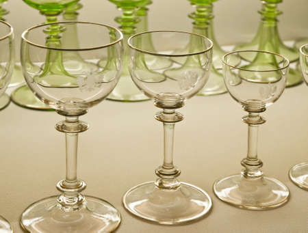 Glassware royal court of Augsburg. Crystal glasses in different colors with the royal coat of arms carvedの写真素材