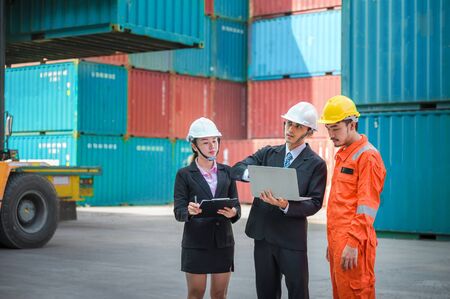 working engineer in the construction container yard.の写真素材