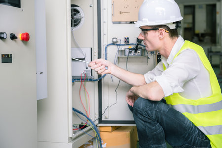 Engineer Worker quality control, maintenance, holding laptop Factory Warehouse Locations plant...