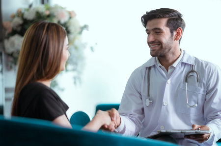 Doctor who specializes in cosmetic surgery is giving advice on how to improve the beauty of the face. And enhancing breasts and good proportionsの写真素材