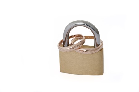 two golden rings in padlockの写真素材