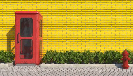 Single old red phone booth in retro style on the footpath in the urban exterior opposite the facade of the yellow brick wall and red fire hydrant. 3D rendering.の写真素材