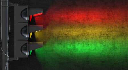 Single traffic light close-up in side view at night. The traffic light casts light on a black wall. Creative conceptual illustration with copy space. 3D renderingの写真素材