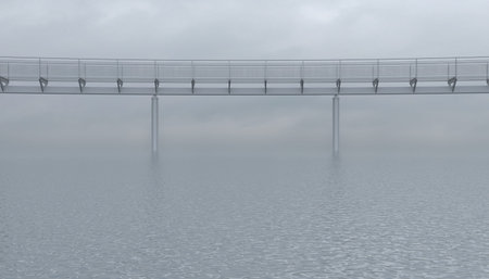 Metal foot bridge above the surface of the sea or ocean in cloudy overcast weather. Empty iron...
