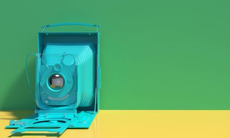 Old retro camera in monochrome turquoise color isolated on green and yellow background. Creative conceptual illustration in cartoon style with copy space. 3D rendering in pastel colorsの写真素材
