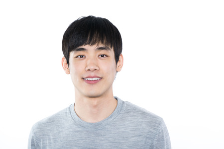 portrait of an asian man with smiling faceの写真素材