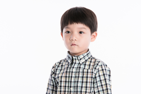 little asian boy on white backgroundの写真素材