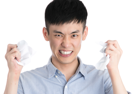 Handsome young asia man - isolated over a white backgroundの写真素材