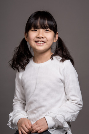 Teenage Asian Girl Child Studio Portrait Shoot - Isolatedの写真素材