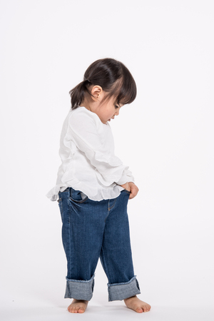 Studio portrait shot of 3-year-old Asian baby - isolatedの写真素材