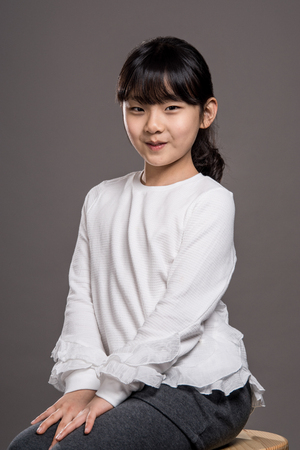 Teenage Asian Girl Child Studio Portrait Shoot - Isolatedの写真素材
