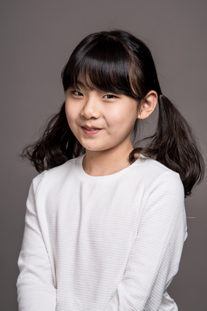 Teenage Asian Girl Child Studio Portrait Shoot - Isolatedの写真素材
