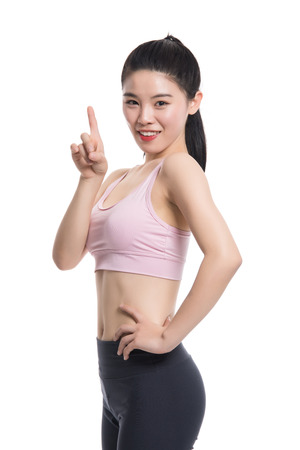 A happy and confident Asian Yoga teacher's studio nostalgia by raising his thumbの写真素材