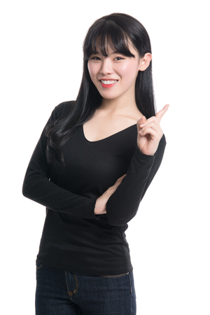 Studio portrait of a happy twenties Asian womanの写真素材