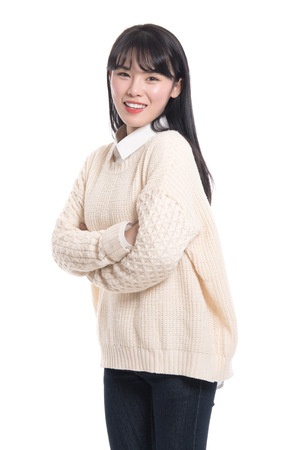 Studio portrait of a happy twenties Asian womanの写真素材