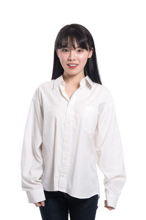 Studio portrait of twenties Asian women smiling confident and happyの写真素材